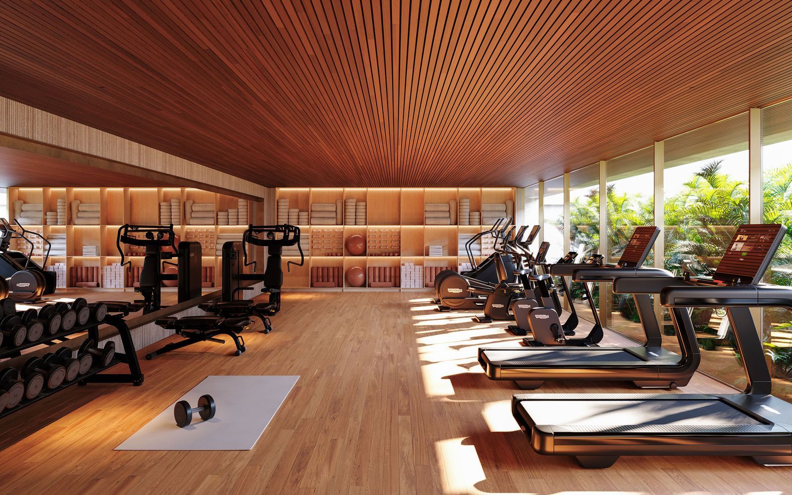 St. Regis Residences: Gym met moderne apparatuur en houten details.