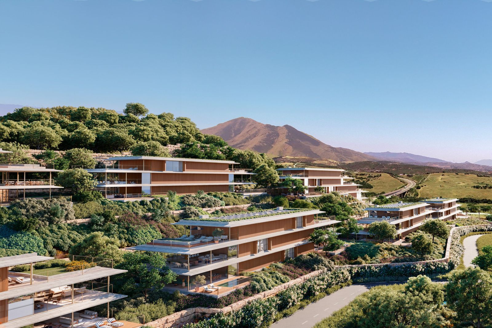 St. Regis Residences met uitzicht op de bergen en groene omgeving.
